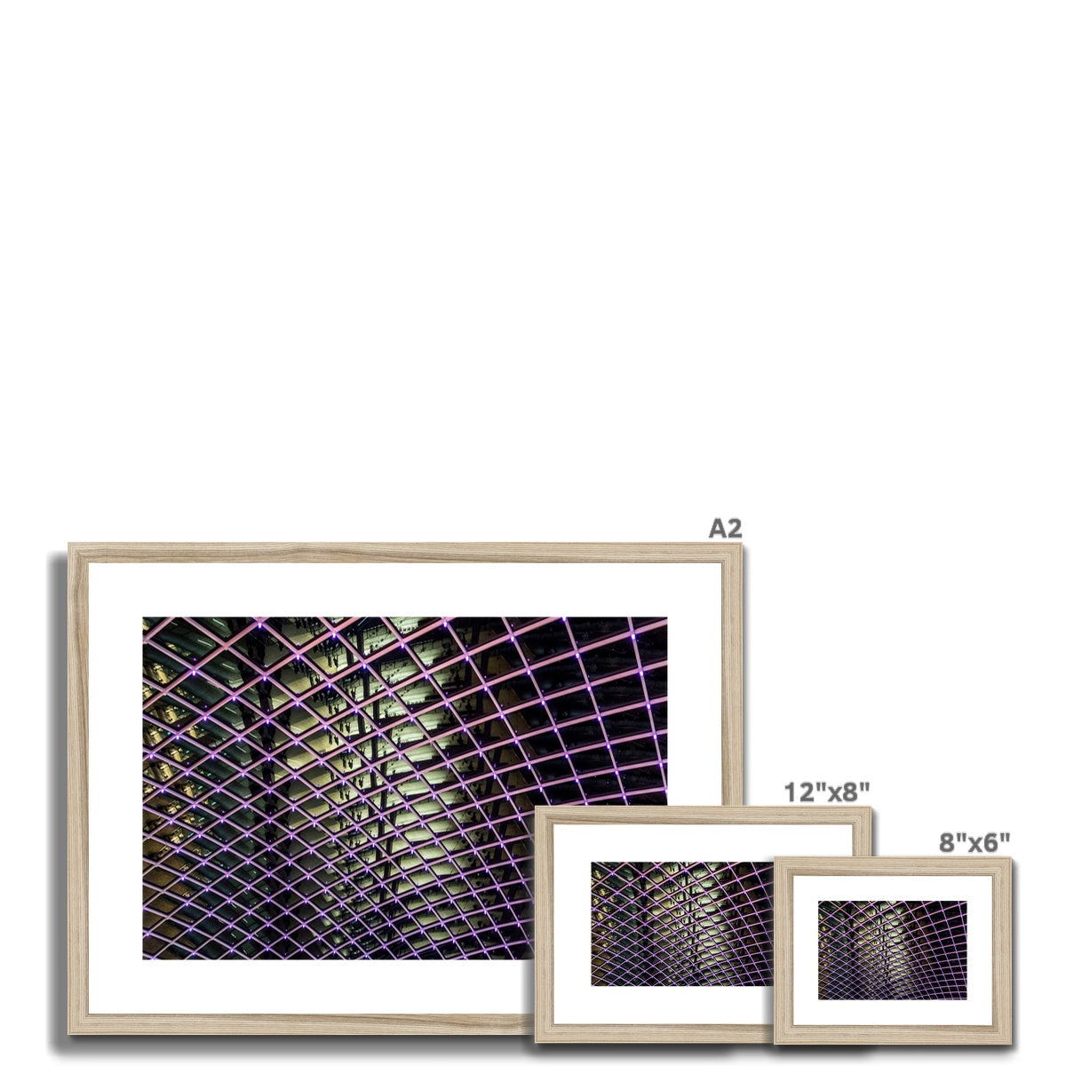 Illuminated grid pattern on a glass ceiling captured at night Framed & Mounted Print