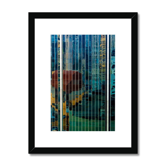 Urban reflections dance across a skyscraper's glazed facade Framed & Mounted Print