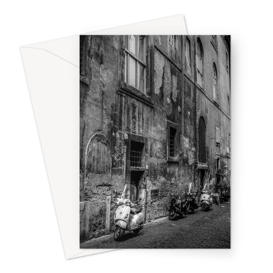 Typical street with parked scooters in the centre of Rome. Italy. Greeting Card