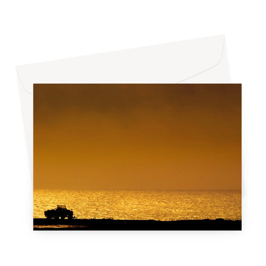 Silhouette of jeep on beach at sunset Greeting Card