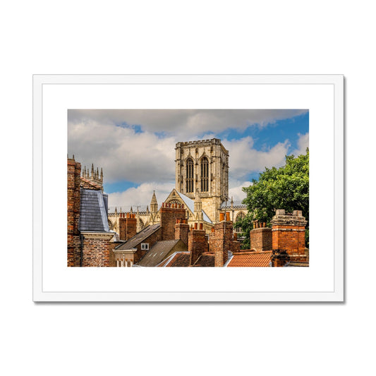 York Minster stands timeless amidst the city's rooftops. York. UK Framed & Mounted Print