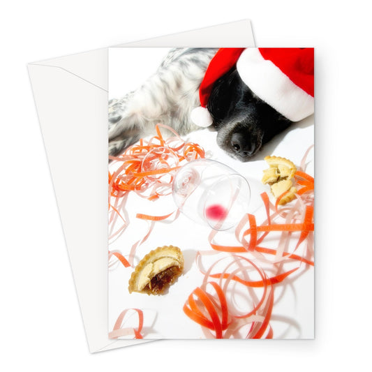 Sleeping dog after Christmas party Greeting Card