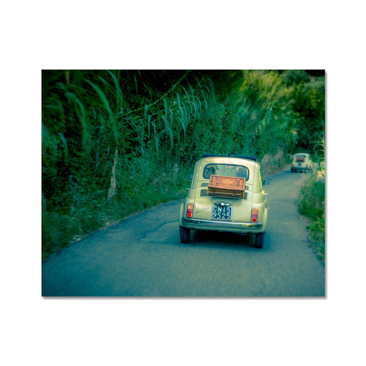 Classic Fiat 500 cars driving on a road in Florence, Italy.  Fine Art Print