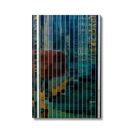 Urban reflections dance across a skyscraper's glazed facade Canvas