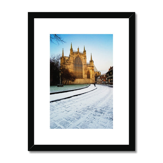 York Minster with College Green and College Street in the  snow, York, North Yorkshire, UK Framed & Mounted Print
