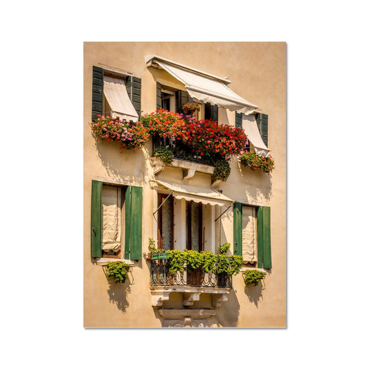 Traditional canal-side cream-rendered house with shuttered windows and window boxes. Venice. Italy. Fine Art Print