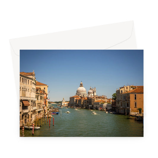 Grand canal in Venice with the domes of the church Santa Maria della  Salute in the distance Greeting Card