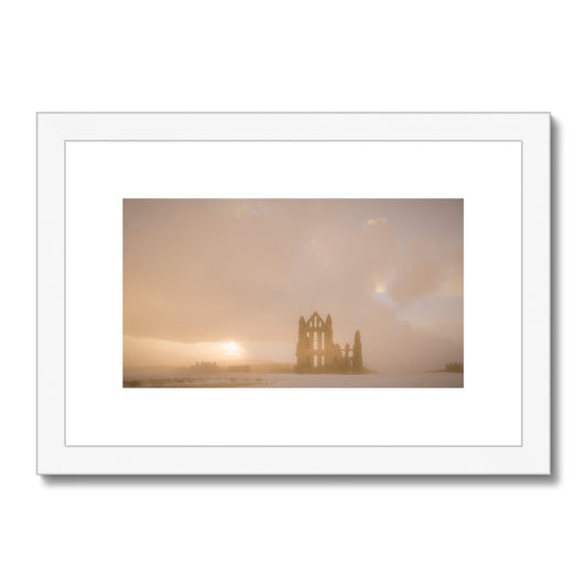 Whitby Abbey in snow, North Yorkshire. UK Framed & Mounted Print