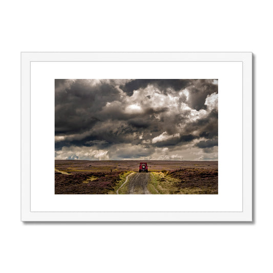 Red Land Rover Defender 110 4WD car on a Green Lane track, North Yorkshire Moors, UK. Framed & Mounted Print