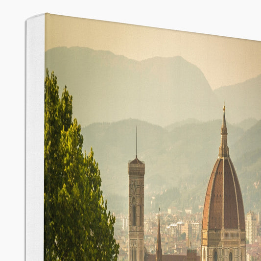 The south façade of Florence Cathedral glimpsed through the trees of San Miniato al Monte.  Italy. Canvas