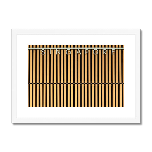 Singapore lettering on a slatted building wall. Framed & Mounted Print