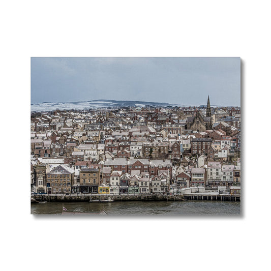 View of Whitby town centre in snow from St Mary's Church, Whitby, UK. Canvas