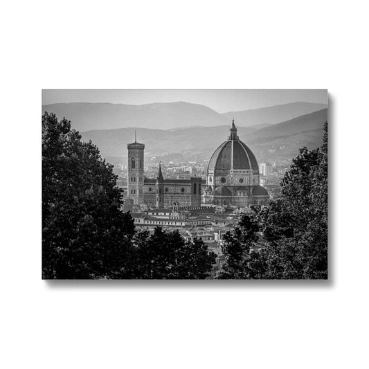 The south façade of Florence Cathedral glimpsed through the trees of San Miniato al Monte. Italy.  Canvas