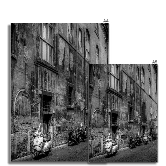 Typical street with parked scooters in the centre of Rome. Italy. Fine Art Print