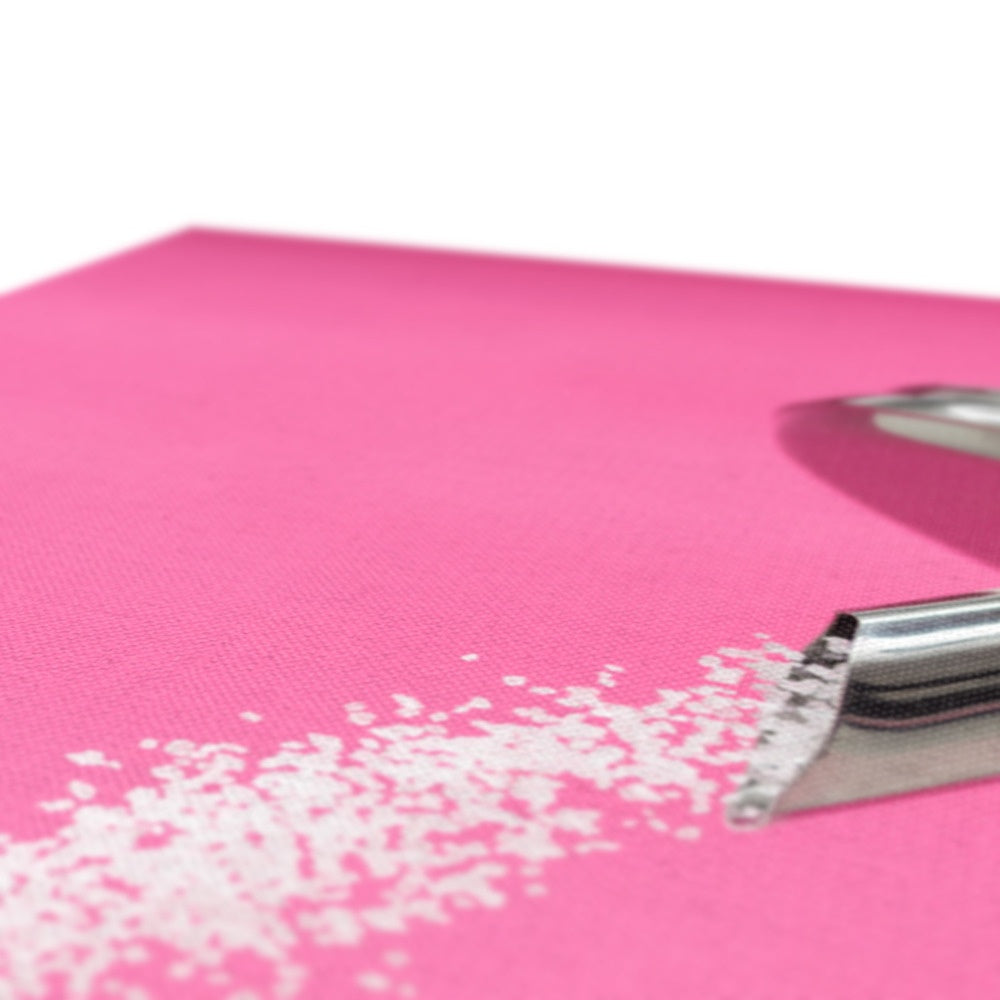 Sugar dispenser pouring against pink background Canvas