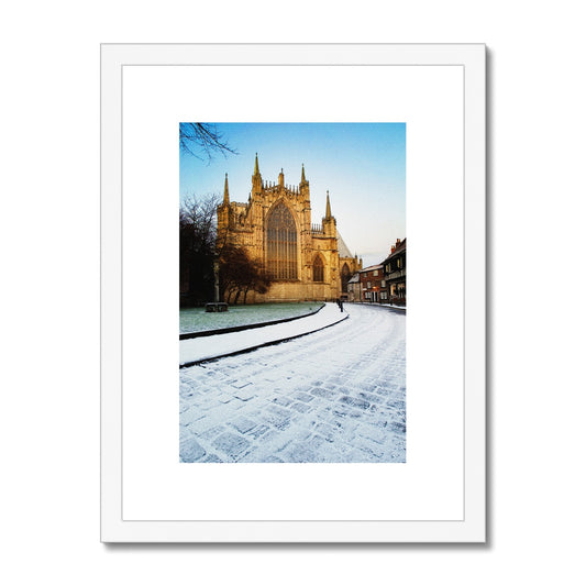 York Minster with College Green and College Street in the  snow, York, North Yorkshire, UK Framed & Mounted Print