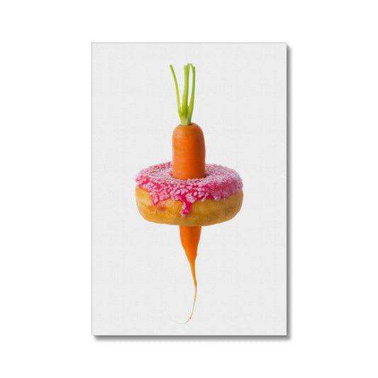 Carrot through a doughnut demonstrating healthy versus unhealthy food choices.  Canvas