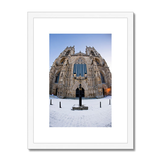 Fish eye shot of the West front of York Minster in snow Framed & Mounted Print