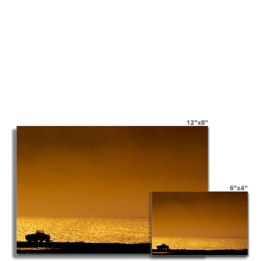 Silhouette of jeep on beach at sunset Fine Art Print