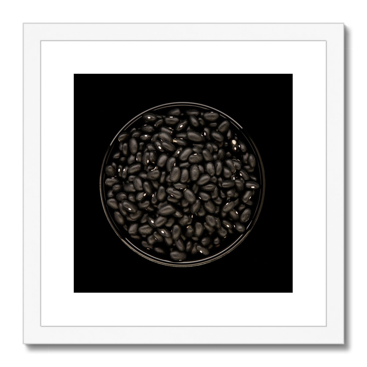 Black beans in black bowl Framed & Mounted Print