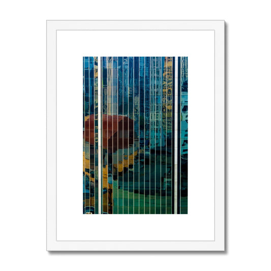 Urban reflections dance across a skyscraper's glazed facade Framed & Mounted Print