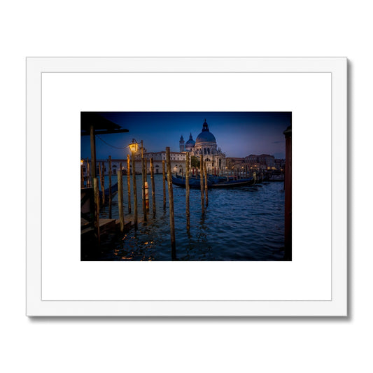 Gondolas moored for the night on the Grand Canal with the church of Santa Maria della Salute in the background. Venice, Italy. - Framed & Mounted Print