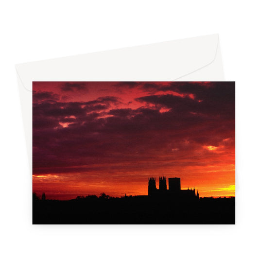 York Minster silhouetted against an orange sky at sunrise Greeting Card