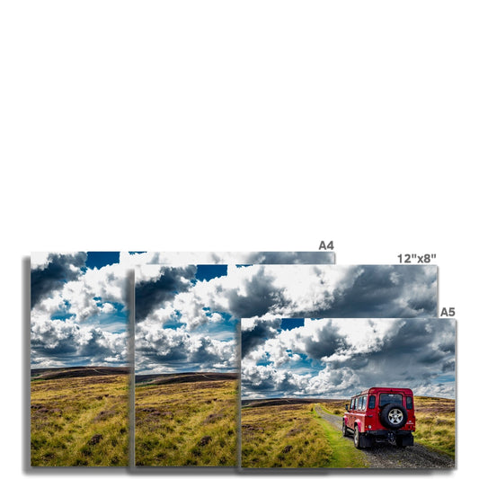 Red Land Rover Defender 110 4WD car navigating a Green Lane track, North Yorkshire Moors, UK. Fine Art Print