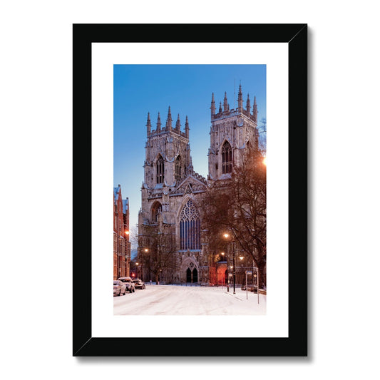 West front of York Minster and Duncombe Place in the snow, York, UK. Framed & Mounted Print