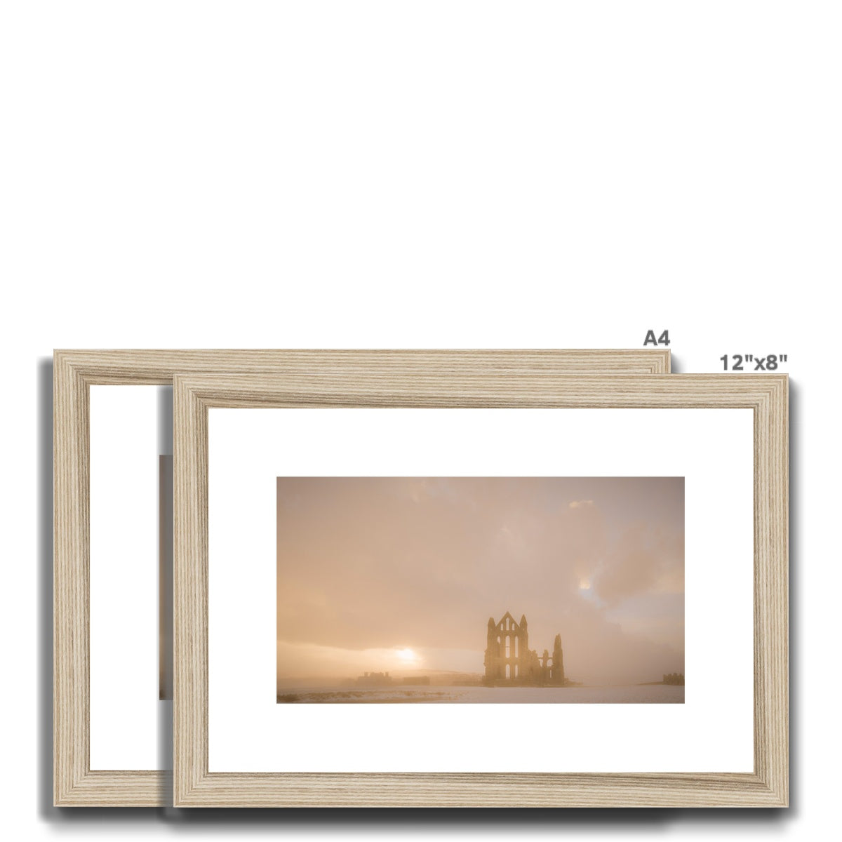 Whitby Abbey in snow, North Yorkshire. UK Framed & Mounted Print