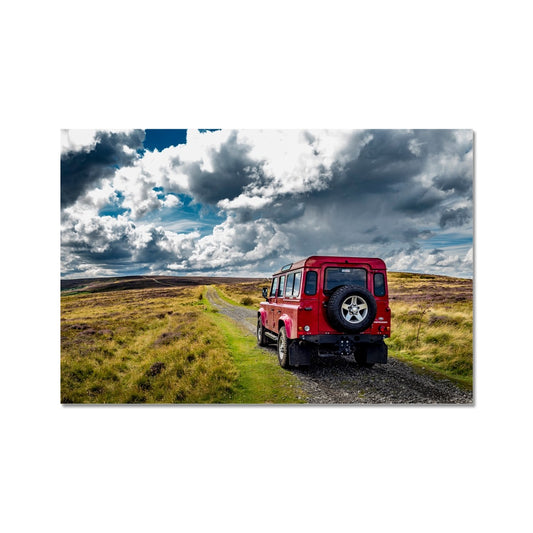 Red Land Rover Defender 110 4WD car navigating a Green Lane track, North Yorkshire Moors, UK. Fine Art Print
