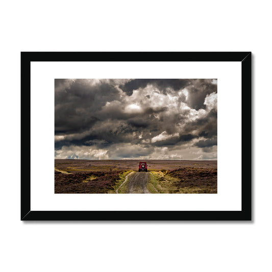 Red Land Rover Defender 110 4WD car on a Green Lane track, North Yorkshire Moors, UK. Framed & Mounted Print