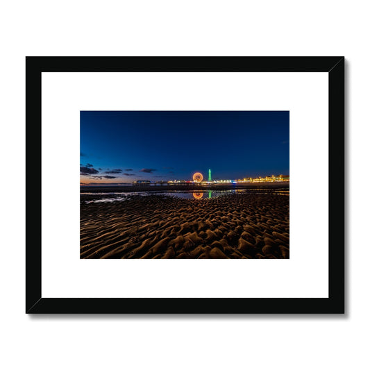 Blackpool Tower and Central Pier with reflection of illuminations Framed & Mounted Print