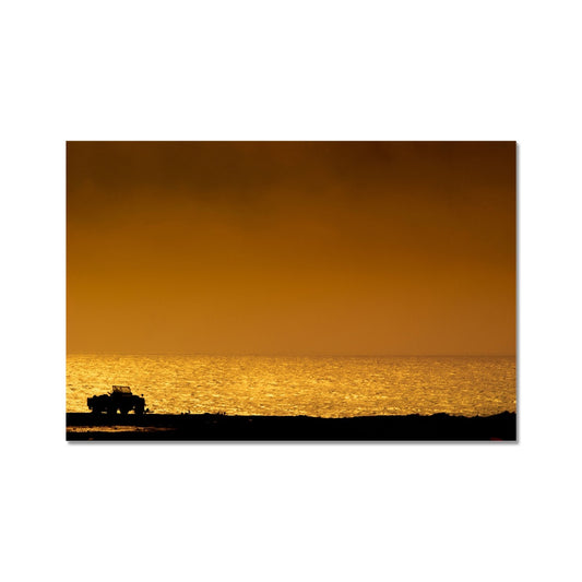 Silhouette of jeep on beach at sunset Fine Art Print