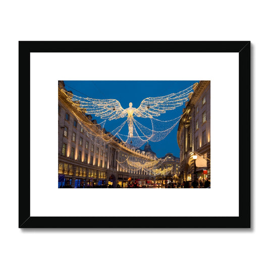 Christmas Angel illuminations in Regent Street, London, UK. Framed & Mounted Print