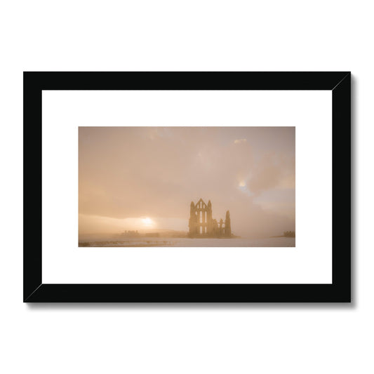 Whitby Abbey in snow, North Yorkshire. UK Framed & Mounted Print