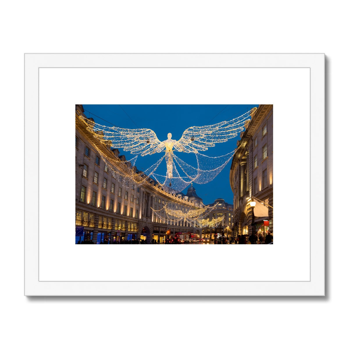 Christmas Angel illuminations in Regent Street, London, UK. Framed & Mounted Print