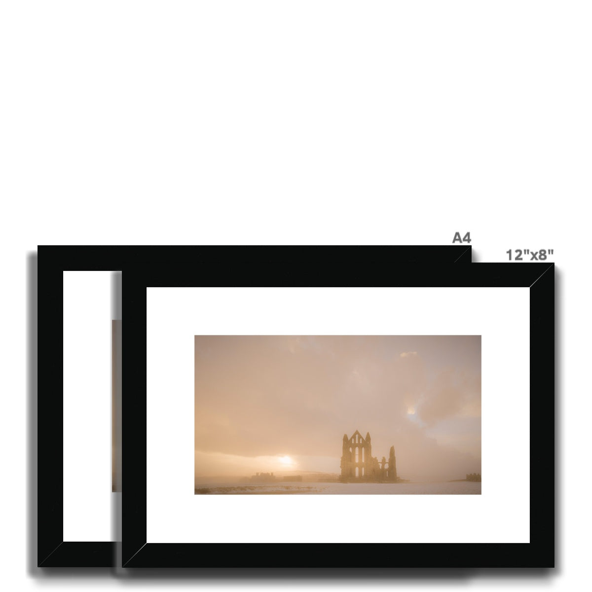 Whitby Abbey in snow, North Yorkshire. UK Framed & Mounted Print