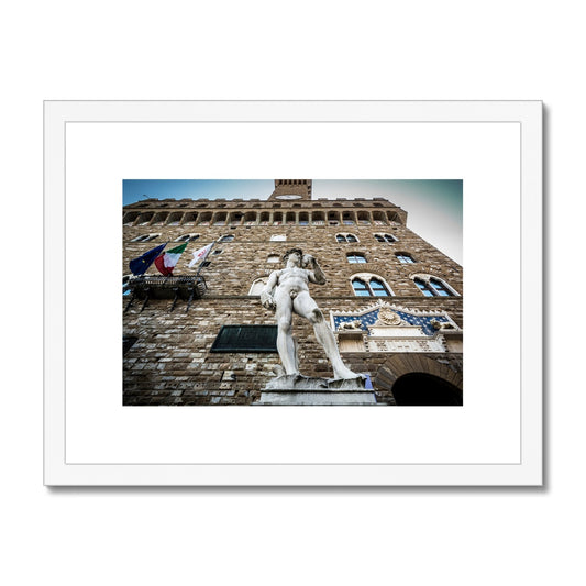 Statue of David overlooking Piazza della Signoria, with Palazzo Vecchio behind. Florence, Italy. Framed & Mounted Print