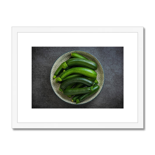 Bowl of green courgettes Framed & Mounted Print