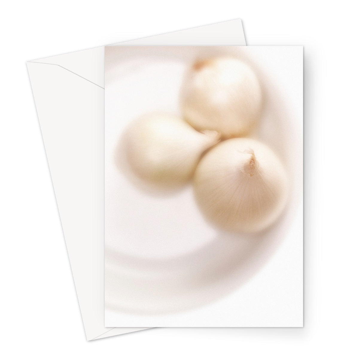 Three white onions on white plate Greeting Card