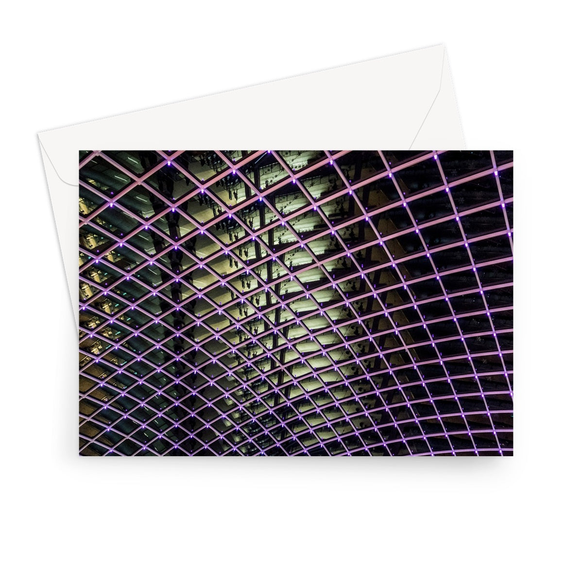 Illuminated grid pattern on a glass ceiling captured at night Greeting Card