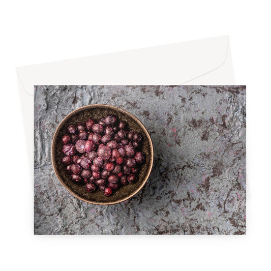 Flat lay: bowl of frozen blueberries  Greeting Card