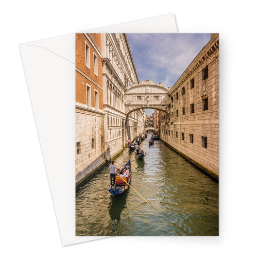 Gondolas passing under the Bridge of sighs. Venice. Italy. Greeting Card