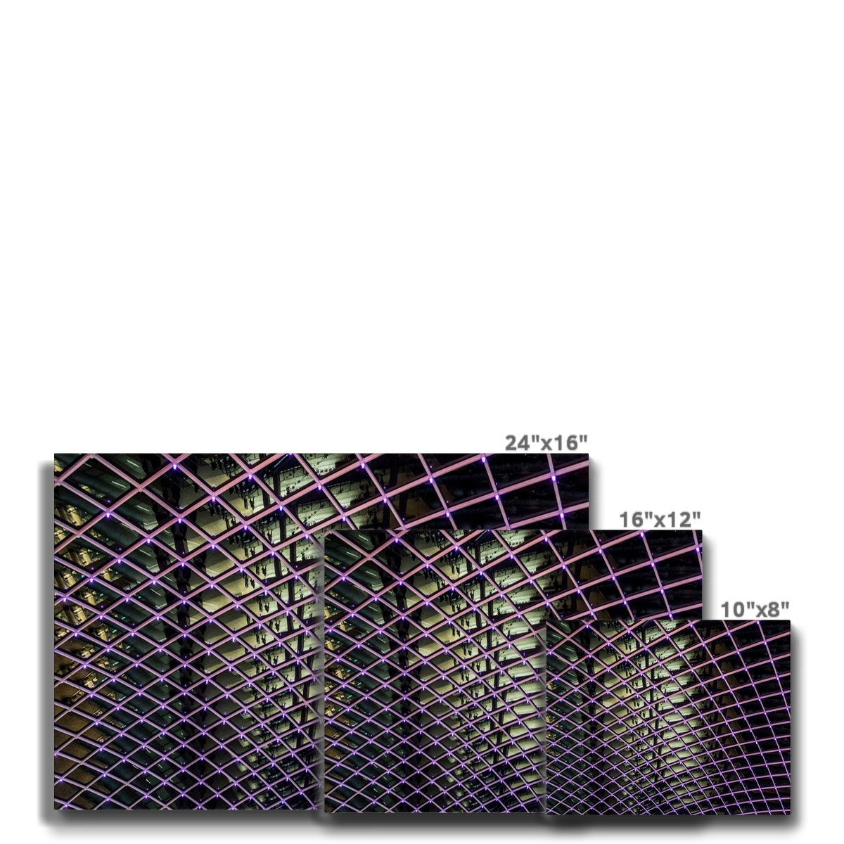 Illuminated grid pattern on a glass ceiling captured at night Canvas
