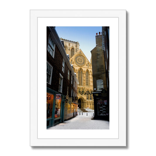 South entrance to York Minster with the Rose window seen from Minster Gates in the snow, York, UK. Framed & Mounted Print