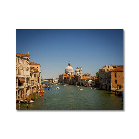 Grand canal in Venice with the domes of the church Santa Maria della  Salute in the distance Canvas